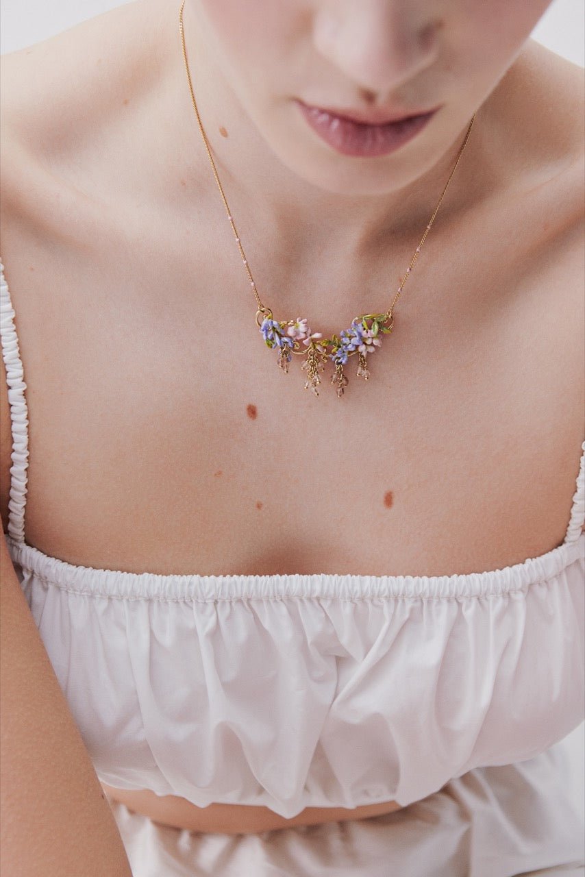 Statement Necklace With Pink And Purple Wisteria On A Golden Arabesque, Adorned With Ivy And Dangling Faceted Pink And White Crystal Beads | AWMM3021 - Les Nereides